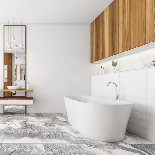 Minimal white bathroom with freestanding tub, vessel sink and warm wood cabinetry